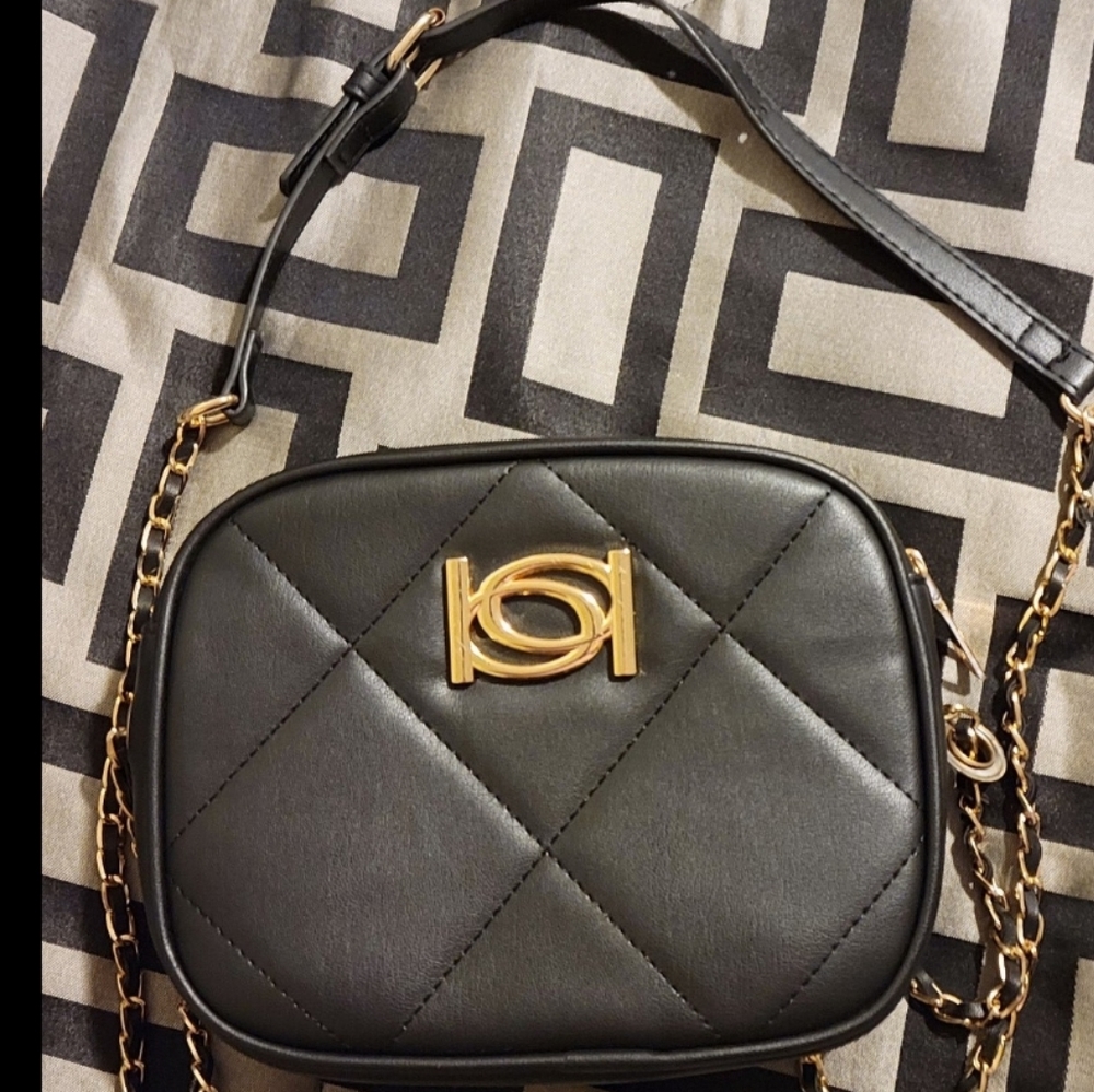 Bebe black shoulder back.